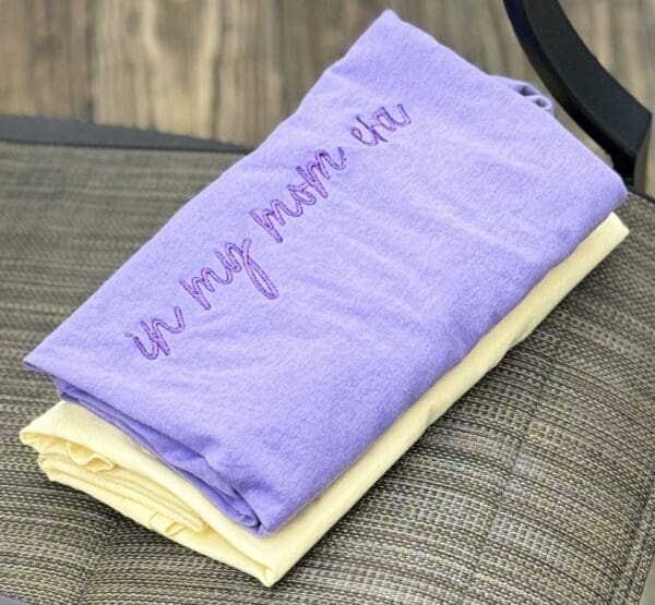 A purple bag with the words " go my pretty life ".